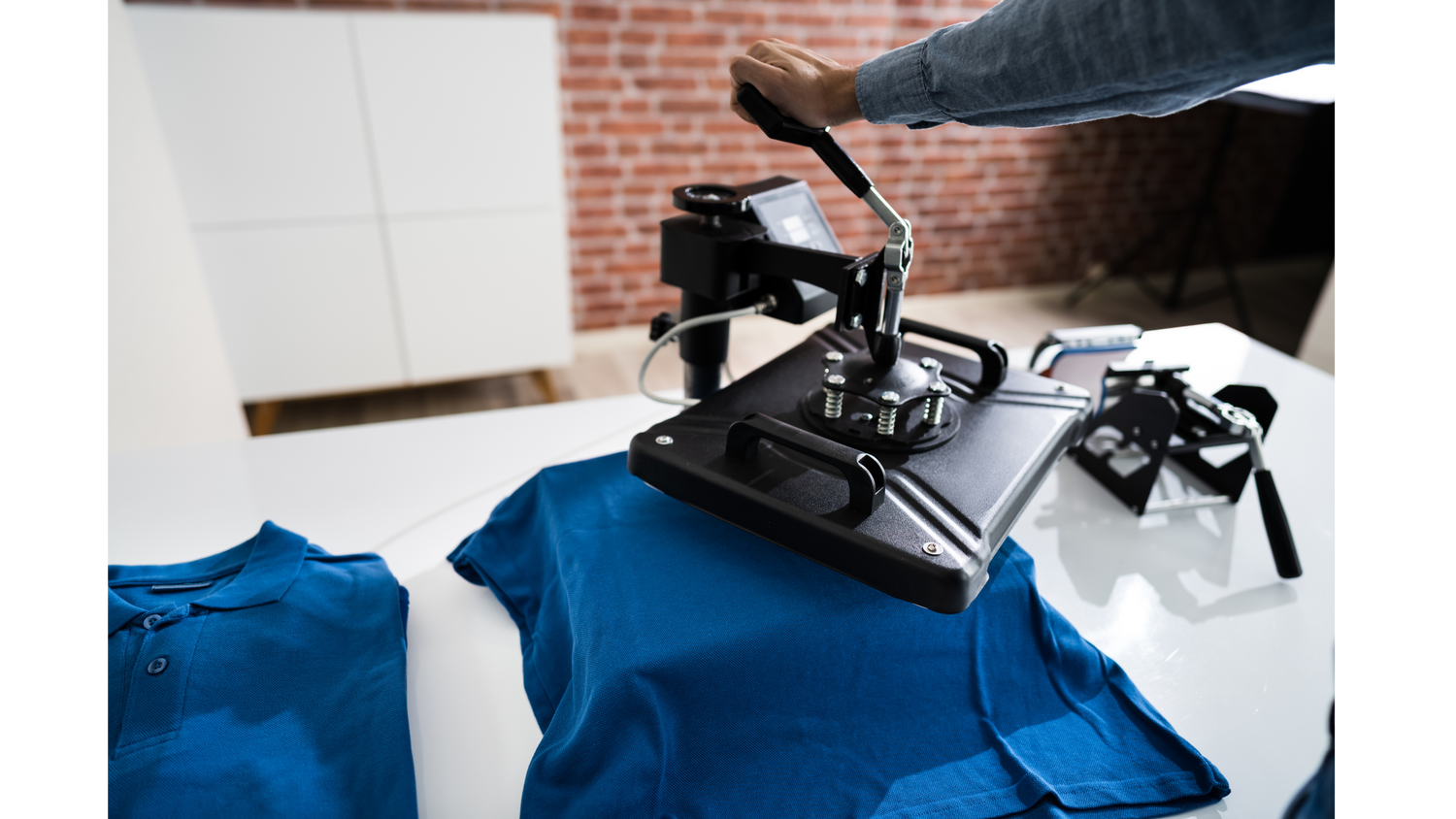 Direct-to-film machine heat transfer pressing on a shirt: Advanced heat transfer technology creating durable and vibrant designs directly onto garments for high-quality custom prints.